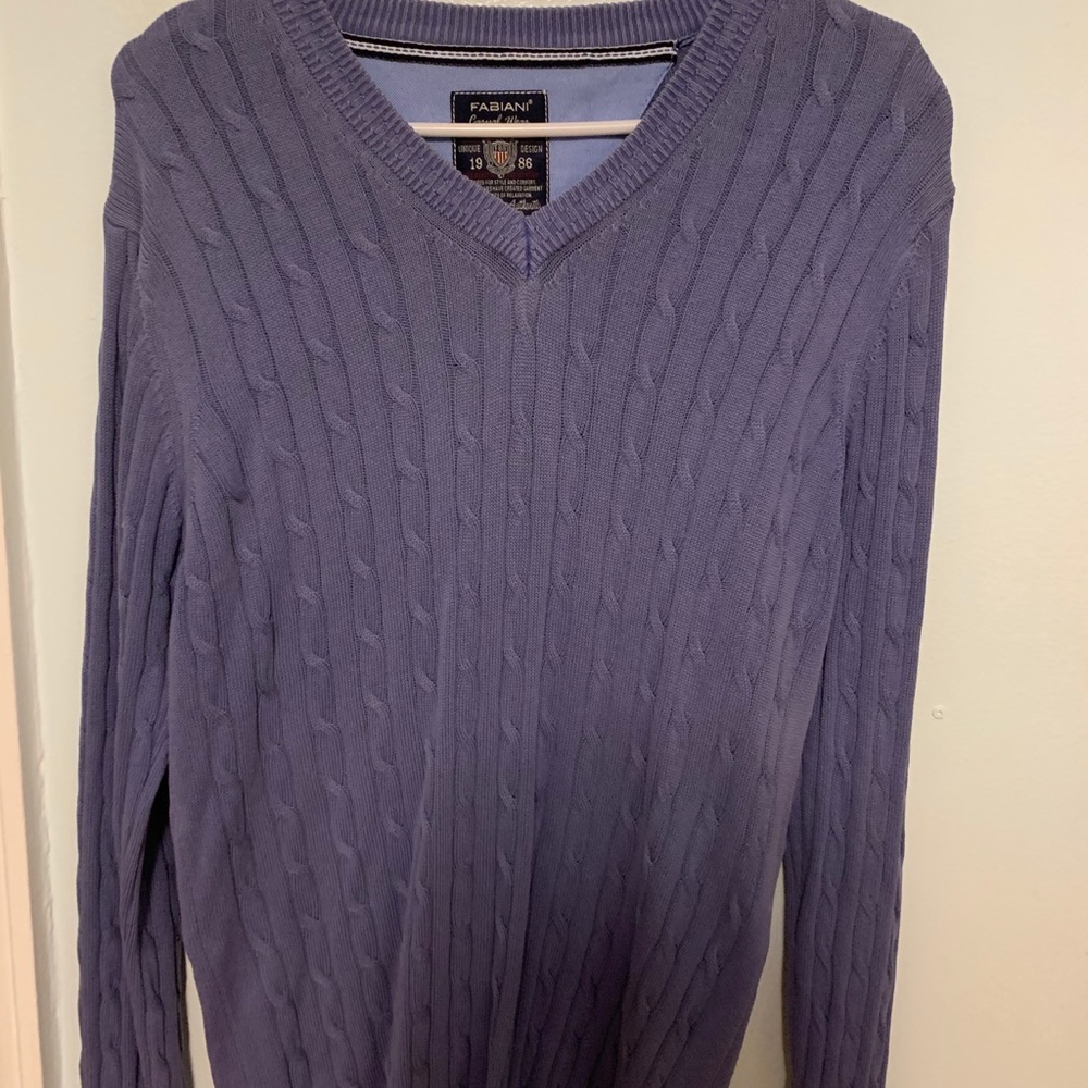 This is a Sweater with long sleeves